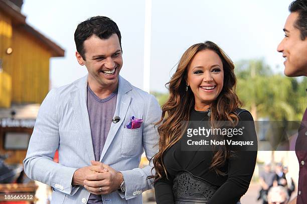 Leah Remini and Tony Dovolani visit "Extra" at Universal Studios Hollywood on October 23, 2013 in Universal City, California.