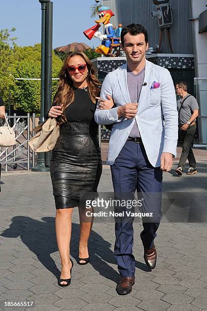 Leah Remini and Tony Dovolani visit "Extra" at Universal Studios Hollywood on October 23, 2013 in Universal City, California.
