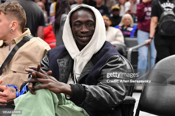 Khaby Lame attends a basketball game between the Los Angeles Clippers and the Golden State Warriors at Crypto.com Arena on December 14, 2023 in Los...