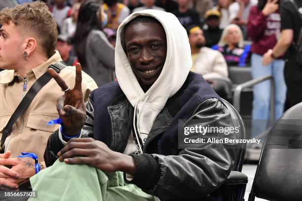 Khaby Lame attends a basketball game between the Los Angeles Clippers and the Golden State Warriors at Crypto.com Arena on December 14, 2023 in Los...