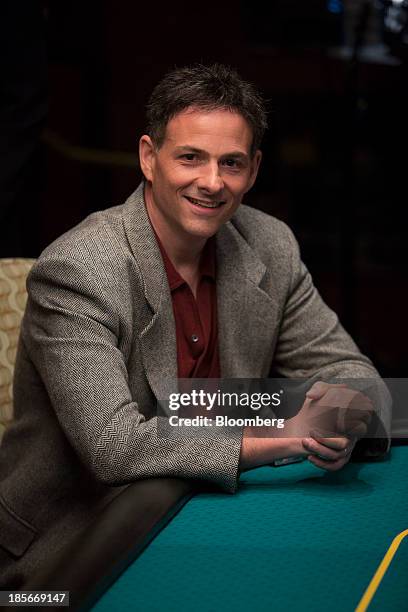 David Einhorn, president of Greenlight Capital Inc., sits at a poker table in Atlantic City, New Jersey, U.S., on Monday, July 22, 2013. Players...