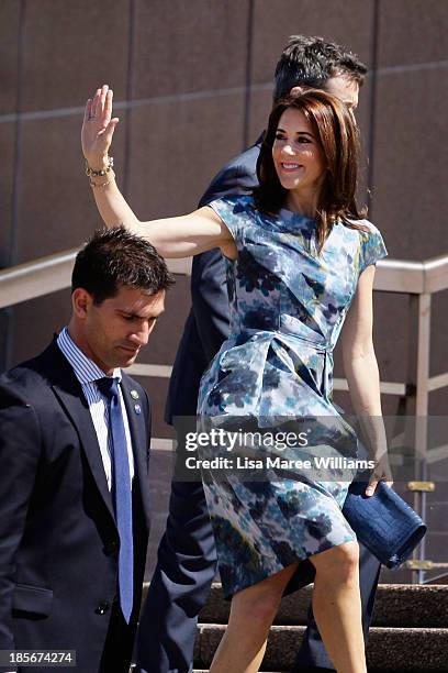 Crown Princess Mary of Denmark waves to the crowd at the Opera House forecourt on October 24, 2013 in Sydney, Australia. Prince Frederik and Princess...