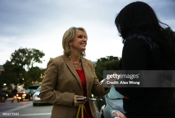 Rep. Renee Ellmers is greeted by an immigration reform activist in front of the U.S. Capitol October 23, 2013 on Capitol Hill in Washington, DC. A...