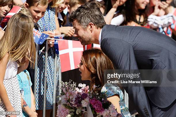 Crown Prince Frederik and Crown Princess Mary of Denmark greet members of the public at the Opera House forecourt on October 24, 2013 in Sydney,...