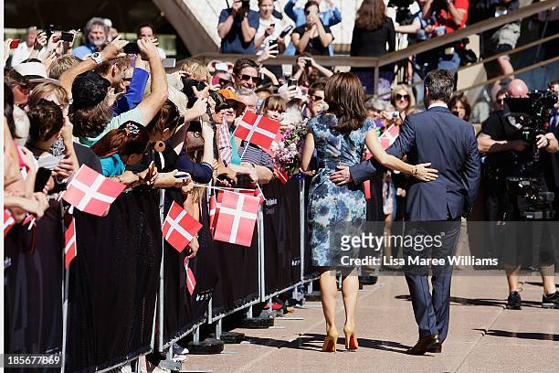 Crown Princess Mary and Crown Prince Frederik of Denmark greet members of the public at the Opera House forecourt on October 24, 2013 in Sydney,...