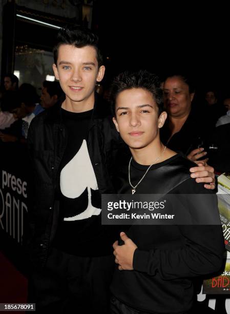 Actors Asa Butterfield and Aramis Knight arrive at the premiere of Paramount Pictures' "Jackass Presents: Bad Grandpa" at TCL Chinese Theatre on...