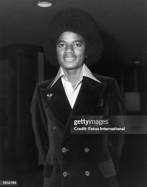 American singer Michael Jackson poses before attending a Doobie Brothers concert at the Century Plaza Hotel, Los Angeles, California, June 1977.