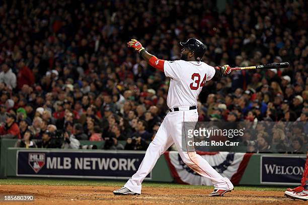 David Ortiz of the Boston Red Sox hits a home run in the seventh inning against the St. Louis Cardinals during Game One of the 2013 World Series at...