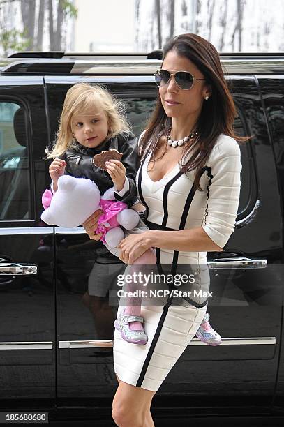 Personality Bethenny Frankel and Bryn Hoppy are seen on October 23, 2013 in New York City.