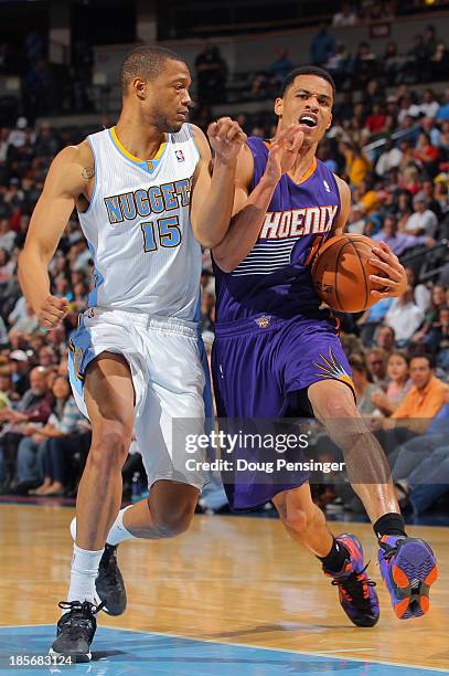 Gerald Green of the Phoenix Suns is fouled by Anthony Randolph of the Denver Nuggets as he drives to the basket during preseason action at Pepsi...