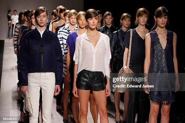 Model walks the runway during the Joe Fresh fashion show at David Pecaut Square on October 23, 2013 in Toronto, Canada.