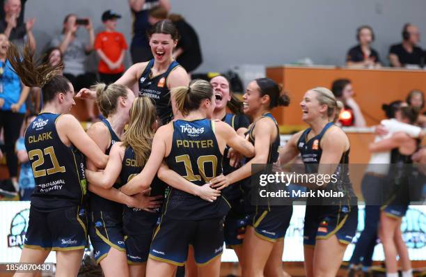 Capitals players celebrate after winning the WNBL match between UC Capitals and Melbourne Boomers at Southern Cross Stadium, on December 15 in...