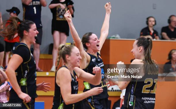Capitals players celebrate after winning the WNBL match between UC Capitals and Melbourne Boomers at Southern Cross Stadium, on December 15 in...
