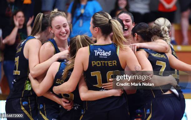 Capitals players celebrate after winning the WNBL match between UC Capitals and Melbourne Boomers at Southern Cross Stadium, on December 15 in...