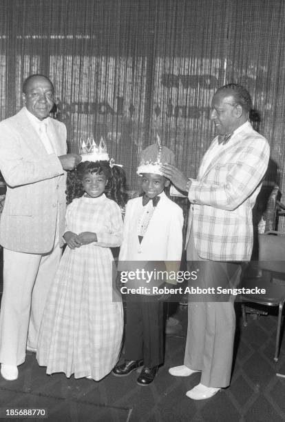 View showing the king and queen of the Bud Billiken Day parade, Chicago, Illinois, mid to late 1960s .