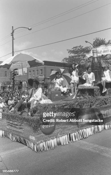 View of the Coca Cola sponsored float as it travels along the parade route during the Bud Billiken Day parade, Chicago, Illinois, mid to late 1960s .