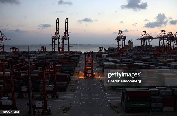 Crane is moved through the Yangshan Deep Water Port, part of China Pilot Free Trade Zone's Yangshan free trade port area, in Shanghai, China, on...