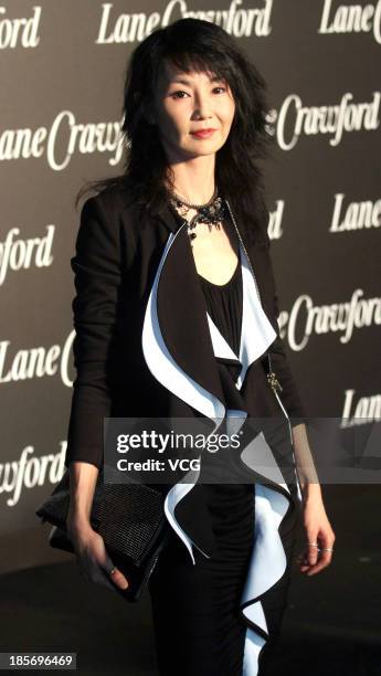 Actress Maggie Cheung attends Lane Crawford flagship store opening ceremony at Shanghai Times Square on October 23, 2013 in Shanghai, China.