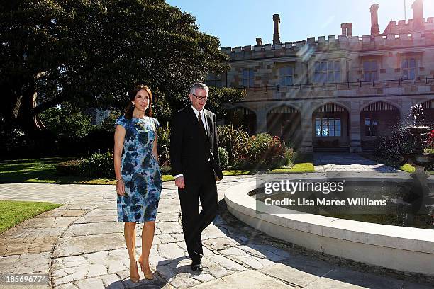 Crown Princess Mary of Denmark walks with Christopher Sullivan in the gardens of Government House on October 24, 2013 in Sydney, Australia. Prince...