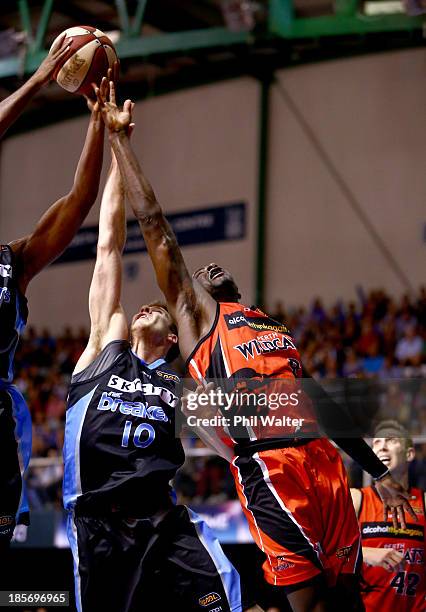 Tom Abercrombie of the Breakers and James Ennis of the Wildcats compete for the ball during the round three NBL match between the New Zealand...