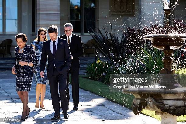 The Governor of NSW, Professor Marie Bashir walks through the gardens of Government House alongside Crown Prince Frederik, Crown Princess Mary of...