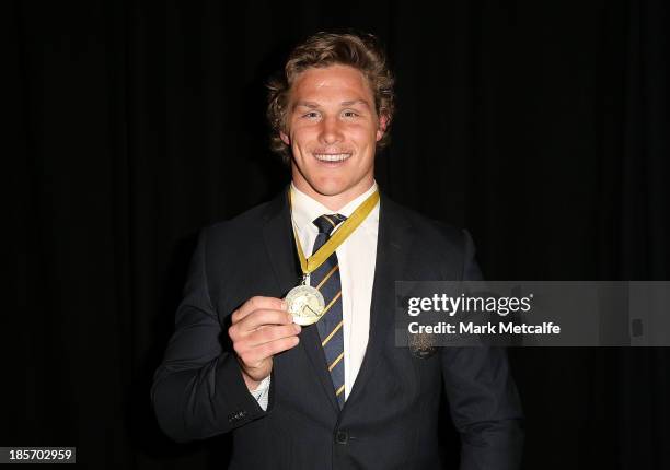 Michael Hooper of the Wallabies poses with the John Eales Medal during the 2013 John Eales Medal at Sydney Convention & Exhibition Centre on October...