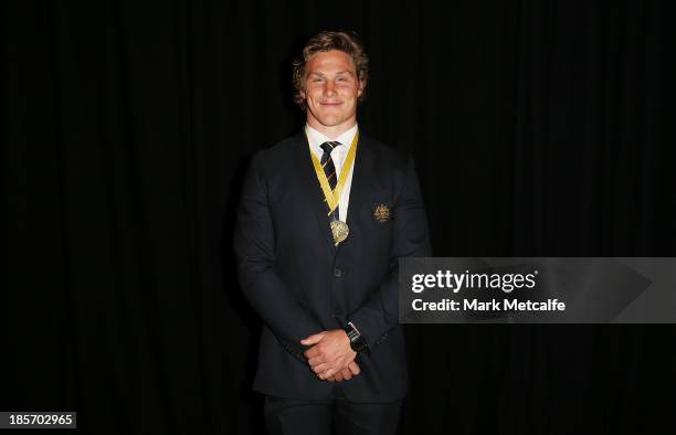 Michael Hooper of the Wallabies poses with the John Eales Medal during the 2013 John Eales Medal at Sydney Convention & Exhibition Centre on October...