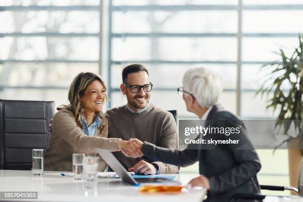 successful deal with insurance agent! - bank manager stock pictures, royalty-free photos & images