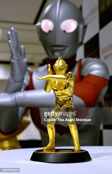 Golden figure of Japanese television series 'Ultraman' is displayed at Shinjuku Takashimaya department store on Octber 24, 2013 in Tokyo, Japan. The...