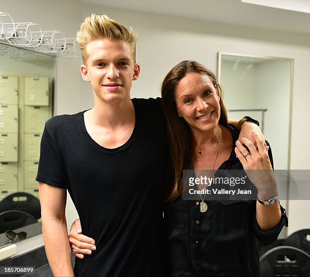 Cody Simpson and his mother Angie Simpson attend his book signing "Welcome To Paradise: My Journey 100% Official" presented by Books And Books at...