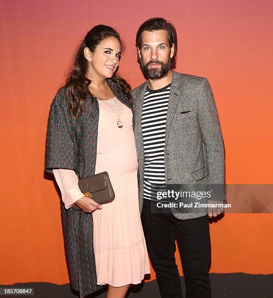 Laure Heriard Dubreuil and Aaron Young arrive at the 2013 Whitney Gala and Studio Party at Skylight at Moynihan Station on October 23, 2013 in New...