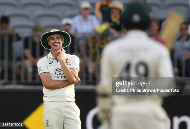 Pat Cummins of Australia smiles during day two of the Men's First Test match between Australia and Pakistan at Optus Stadium on December 15, 2023 in...