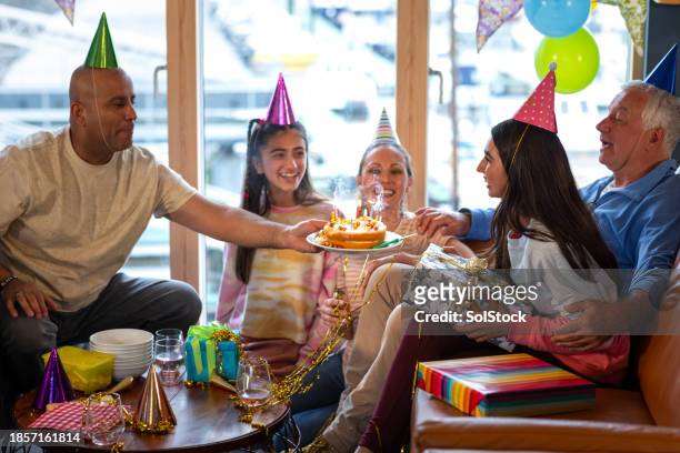 blowing out candles on my birthday cake - escaping room stock pictures, royalty-free photos & images