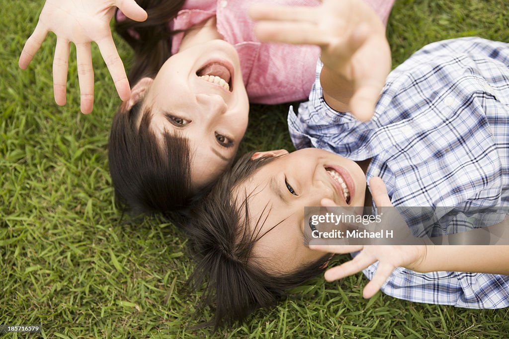 Young mother and child having fun in the park