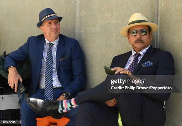 Michael Vaughan and Ravi Shastri working for Fox Sports wait in the shade before day two of the Men's First Test match between Australia and Pakistan...