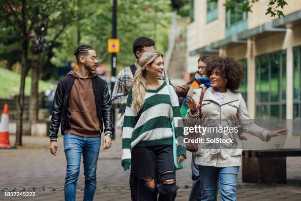 friends walking to university - student individuality stock pictures, royalty-free photos & images