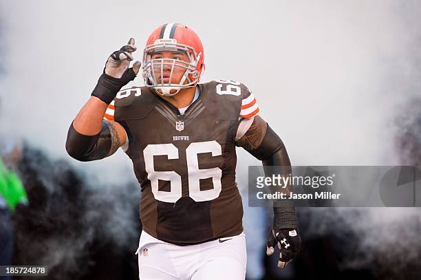 Guard Shawn Lauvao of the Cleveland Browns celebrates during player introductions prior to the game against the Detroit Lions at FirstEnergy Stadium...