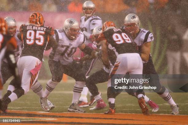 Nate Solder and Logan Mankins of the New England Patriots pass block during their game against the Cincinnati Bengals at Paul Brown Stadium on...