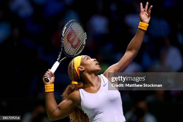 Serena Williams of the United States serves to Petra Kvitova of Czech Republic during day three of the TEB BNP Paribas WTA Championships at the Sinan...