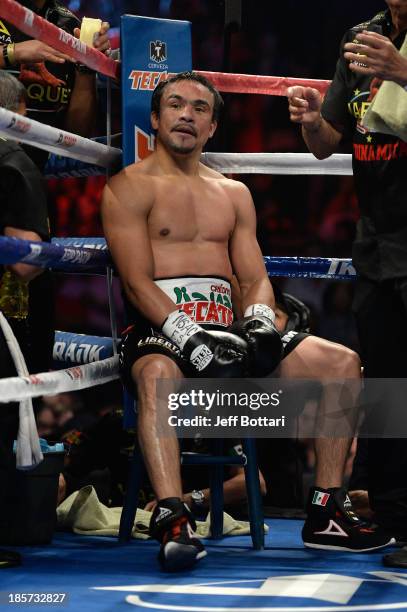 Juan Manuel Marquez sits in his corner between rounds during his bout against WBO welterweight champion Timothy Bradley Jr. At the Thomas & Mack...