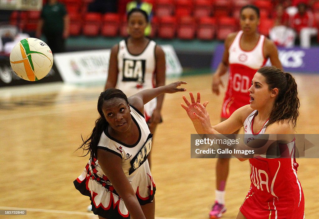 Mia Ritchie Mia Ritchie of England passes the ball while Kemba Duncan of Trinidad ...