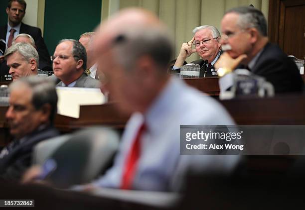Rep. Joe Barton listens as he questions during a hearing on implementation of the Affordable Care Act before the House Energy and Commerce Committee...