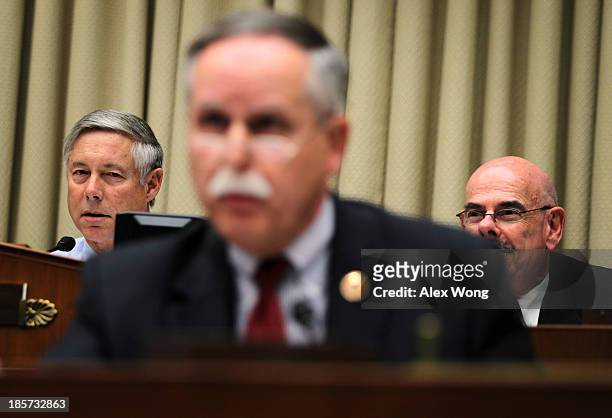 Rep. David McKinley speaks as committee chairman Rep. Fred Upton and ranking member Rep. Henry Waxman listen during a hearing on implementation of...