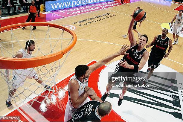 Casey Jacobsen, #23 of Brose Baskets Bamberg in action during the 2013-2014 Turkish Airlines Euroleague Regular Season Date 2 game between Real...