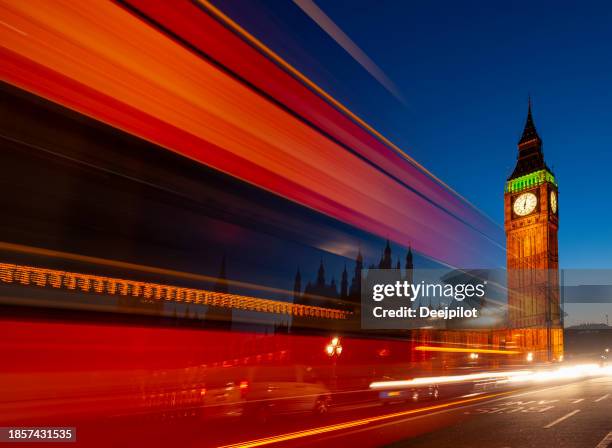 big ben clock tower with blurred traffic light trials, london, uk - time lapse clock stock pictures, royalty-free photos & images