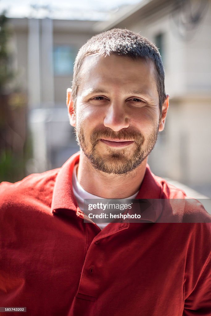 Portrait of small business manager outside warehouse