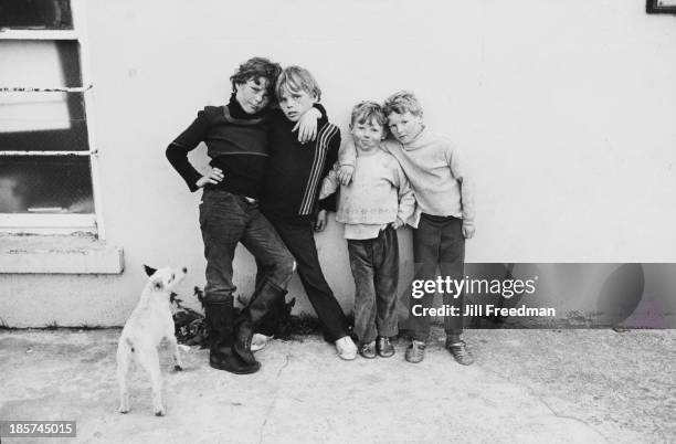 Four friends pose for a picture in Listowel, County Kerry, Ireland, circa 1974.