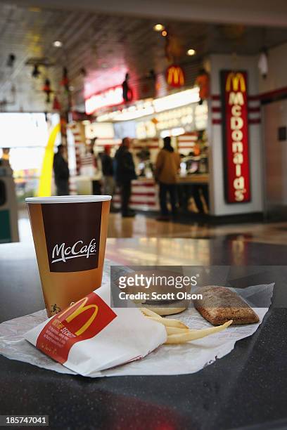 In this photo illustration, items are shown from a McDonald's restaurant on October 24, 2013 in Des Plaines, Illinois. McDonald's has announced it...