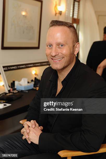 Make-up artist Gregory Arnolds poses at the CFDA/Vogue Fashion Fund Fashion Show Backstage Beauty by MAC Cosmetics and Living Proof at Chateau...