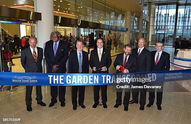 Al Trautwig, Willis Reed, Hank Ratner, Governor Andrew Cuomo, Jim Dolan, Mark Messier and Gordon A. Smith attend Madison Square Garden transformation...